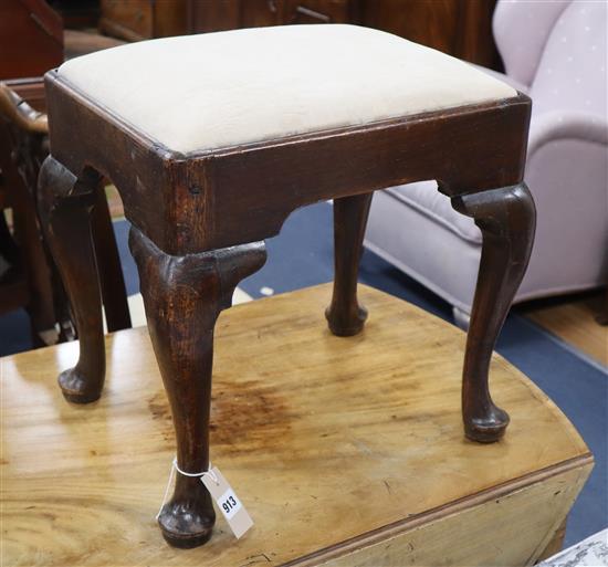 An 18th century oak cabriole leg stool with upholstered drop-in seat W.45cm